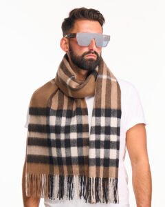 An Edinburgh Cashmere stole alongside some accessories.